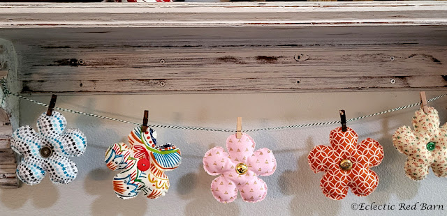 Garland of flowers. Share NOW. #garland, #flowers, #fabricflowers, #crafting, #eclecticredbarn